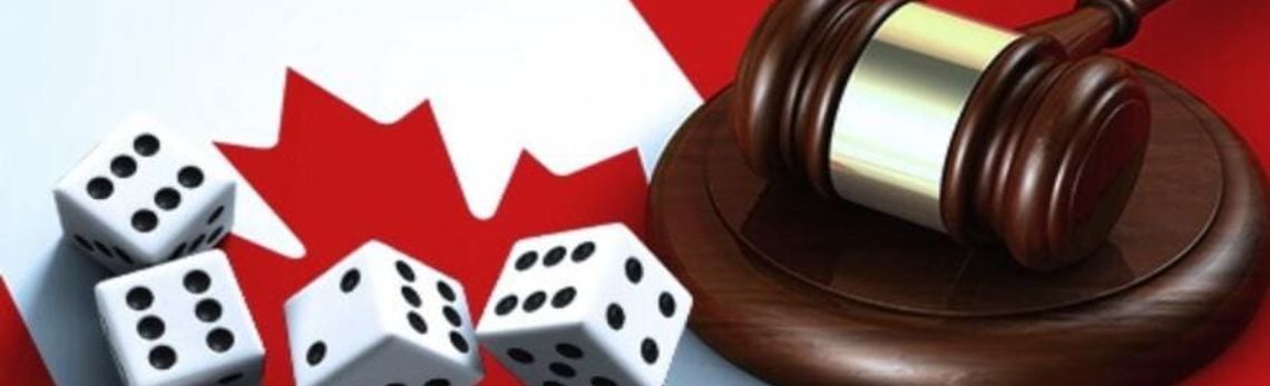 casino dice and judge's hammer on canadian flag